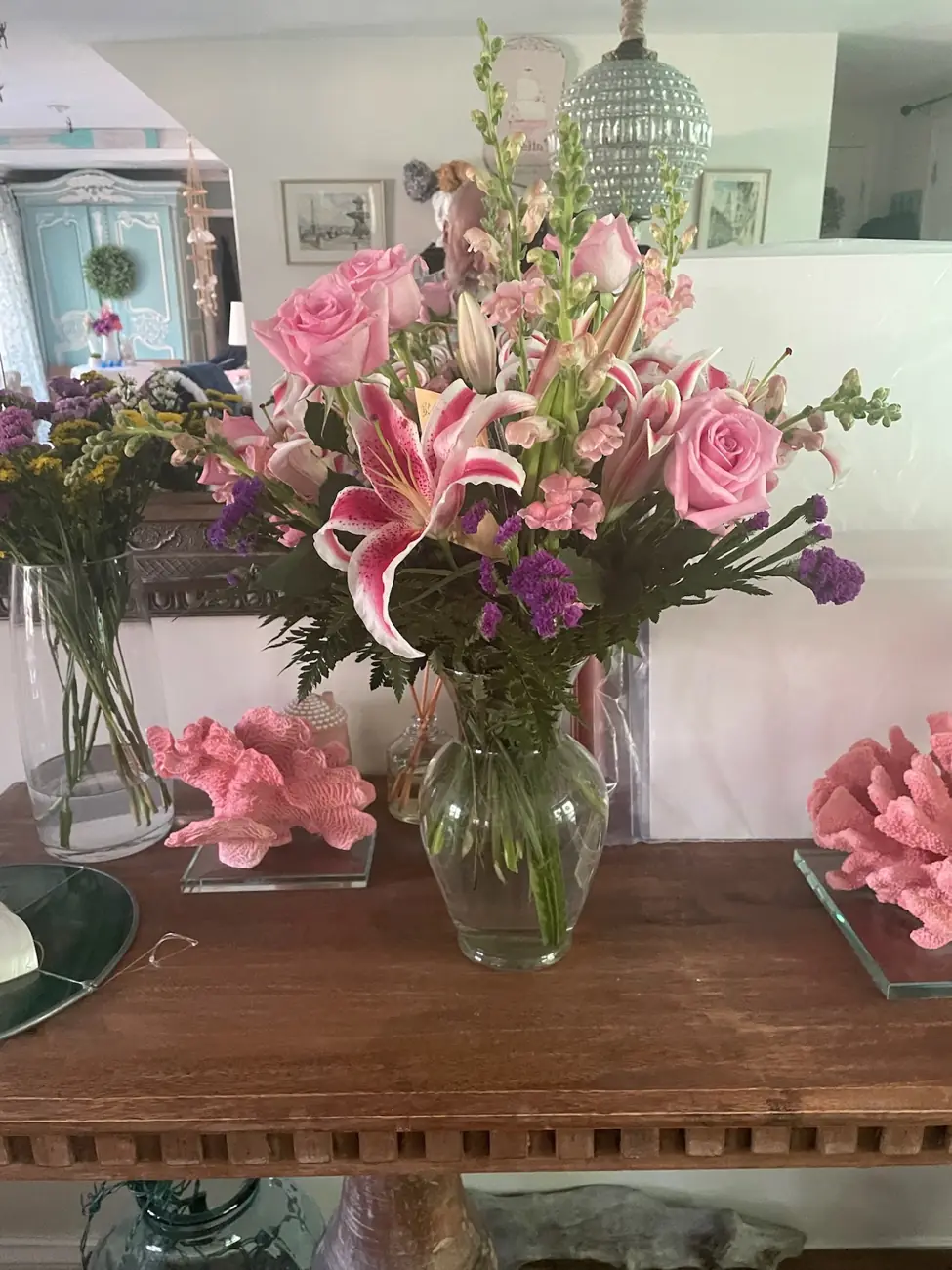 Tall arrangement of pink lilies